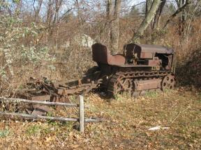 Old farm machinery at The Butterfly Garden. Photo by Daniel Chazin.