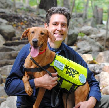 Joshua Beese and Dia the Conservation Detection Dog. Photo by Heather Darley.